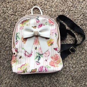 Betsey Johnson Mini Bow Backpack 10 X 3.5 inches.