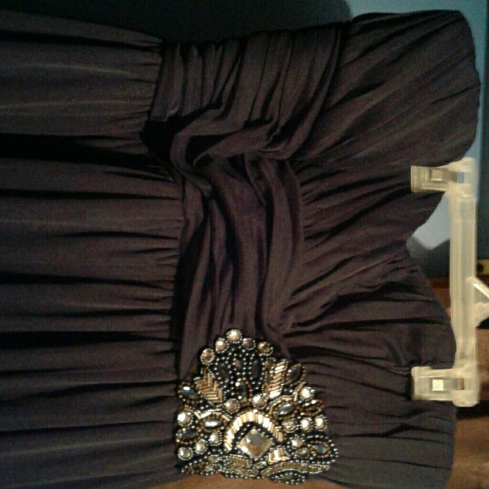 Blue dress with gem on "belt part"