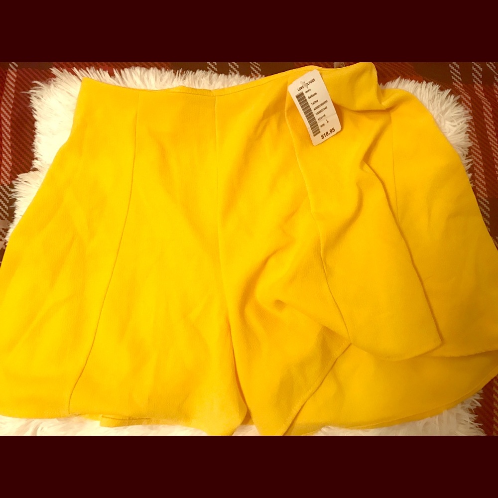 High waisted yellow shorts. NWT