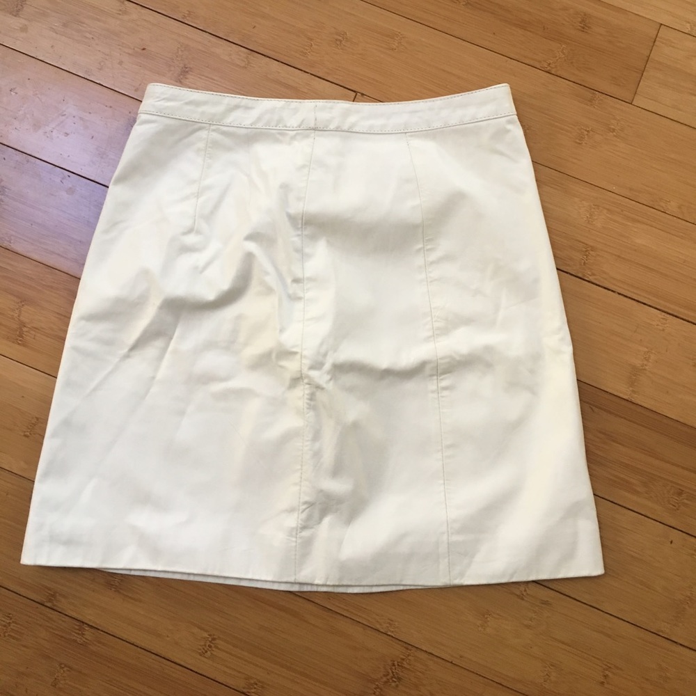 Berman's white leather mini skirt