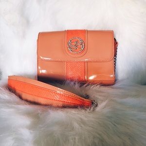 "BEBE" bag, orange color. Very cute!