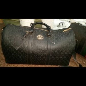 Gucci duffle bags