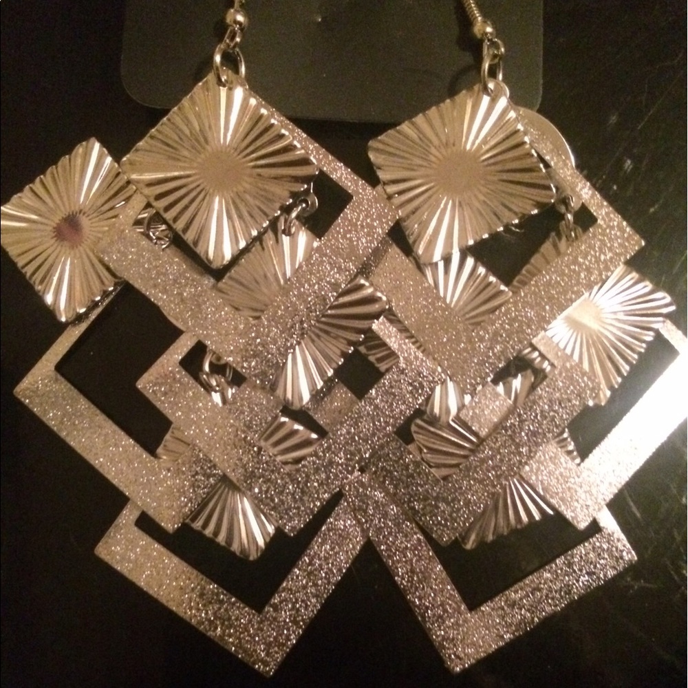 (4 for $20) brand new silver toned earrings