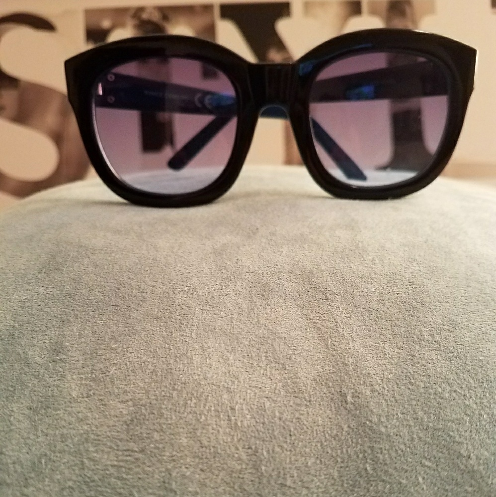 Vince Camuto sun glasses.