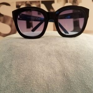 Vince Camuto sun glasses.