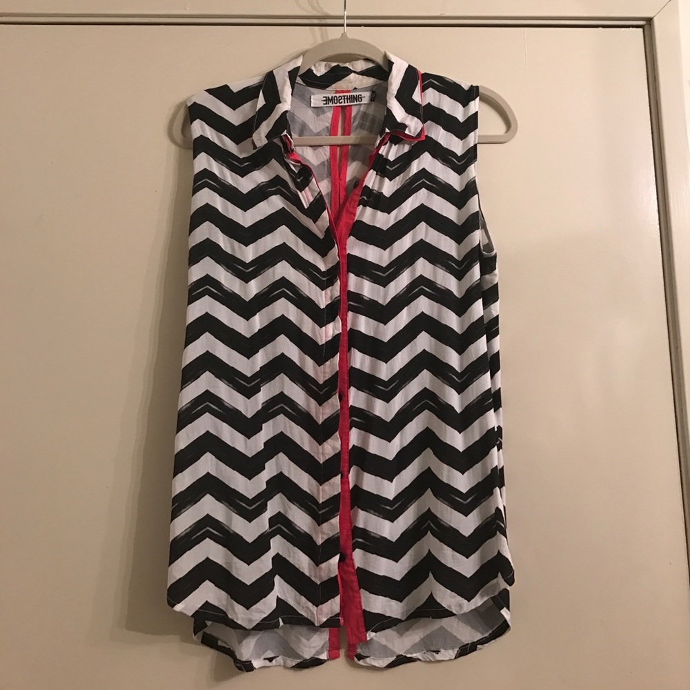 Something sleeveless button up w/ contrast detail.
