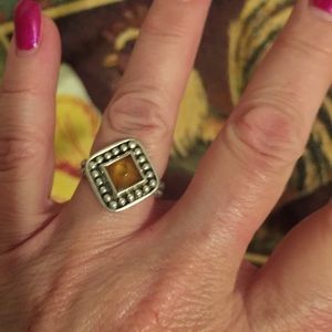 Unique sterling silver ring with amber stone