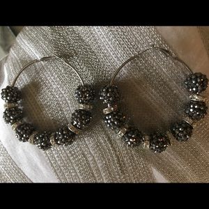 Black and silver hoop earring with beads