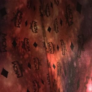 Authentic MCM clutch pouch galaxy inside