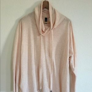 Long asymmetrical blush pink light sweater