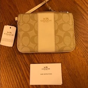 SMALL WRISTLET IN SIGNATURE CANVAS by Coach