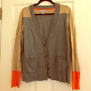 Cozy grey and tan sweater with pop of orange