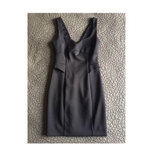 Little black dress from with a peplum detail.