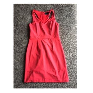 Fitted, bright red racerback dress. True to size.