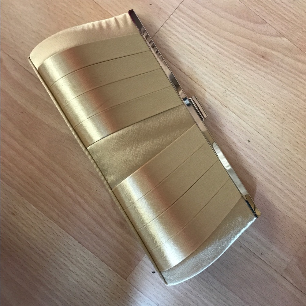 All gold clutch... 100% polyester
