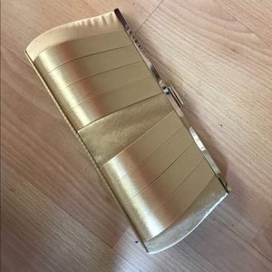 All gold clutch... 100% polyester