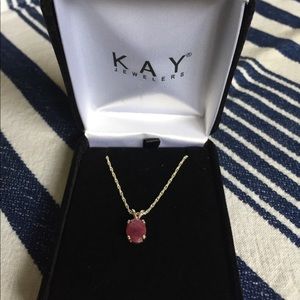 Natural Ruby set in sterling Silver on 18in chain