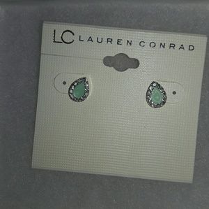 Light blue tear drop stud earrings.