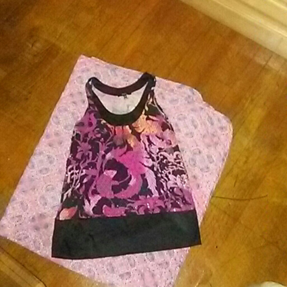Express "exotic-colored" top