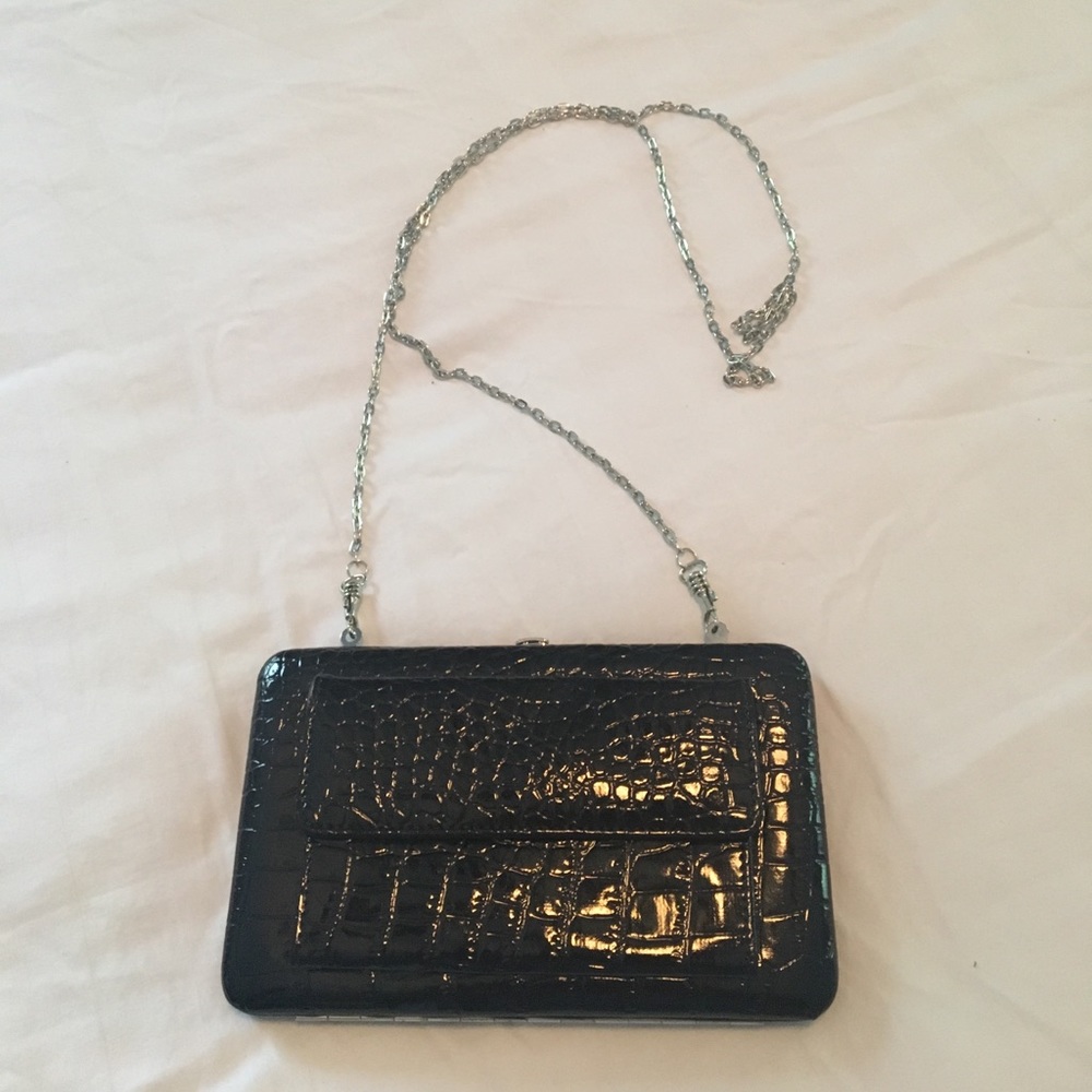 Black slim purse. Never used.