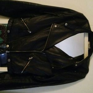 Black leather look short biker jacket..