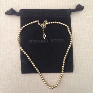 MK gold tone metal beaded necklace