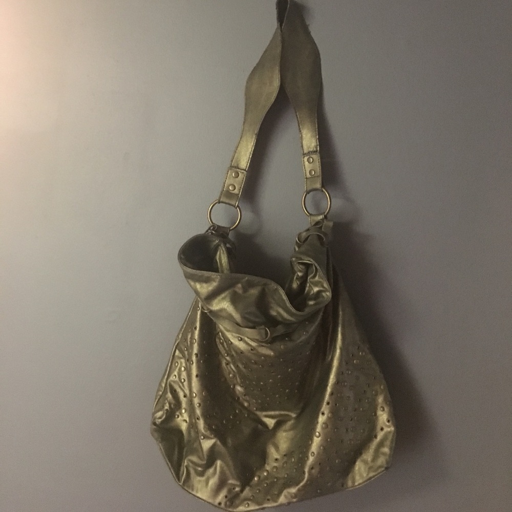 Studded metallic bag