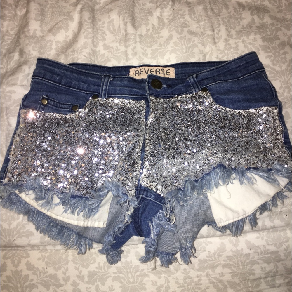 Reverse jean shorts with sequin patch front
