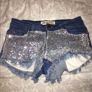 Reverse jean shorts with sequin patch front