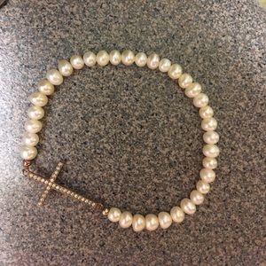 Pearl and cross bracelet