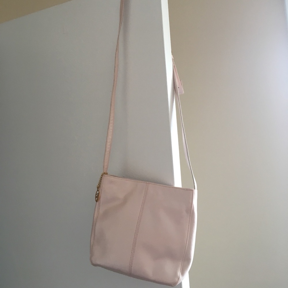Never used light pink Leather Co. cross body purse
