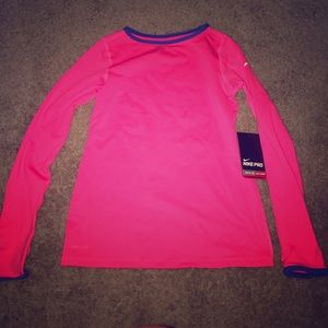 Bright pink and cobalt blue Nike pro