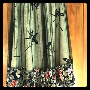 Unique skirt with floral trim