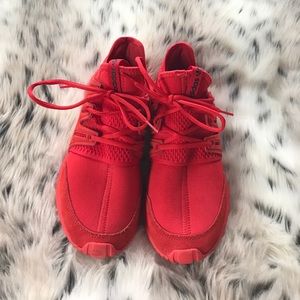 Red Adidas high top shoes