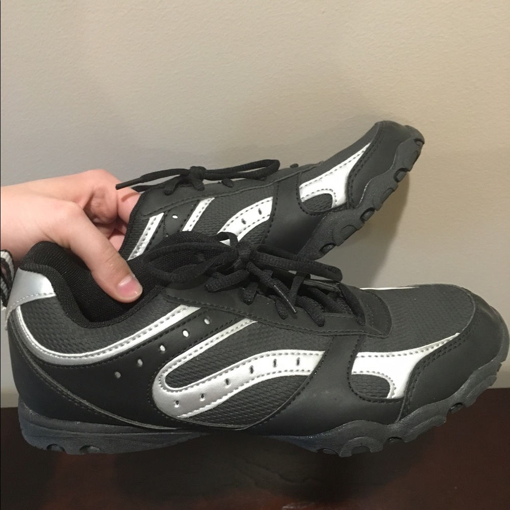Black and silver tennis shoes