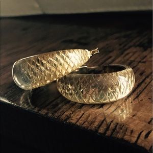 Gold-colored hoop earrings, costume jewelry