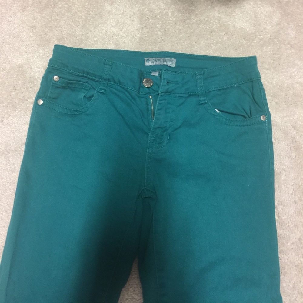 Green skinny jeans