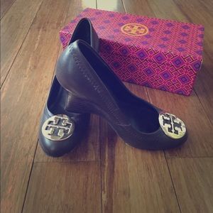 Dark Brown Tory burch closed toe wedge heel.