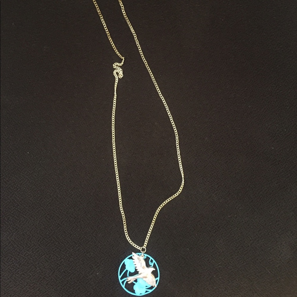 Long elegant Mexican style bohemian bird necklace.