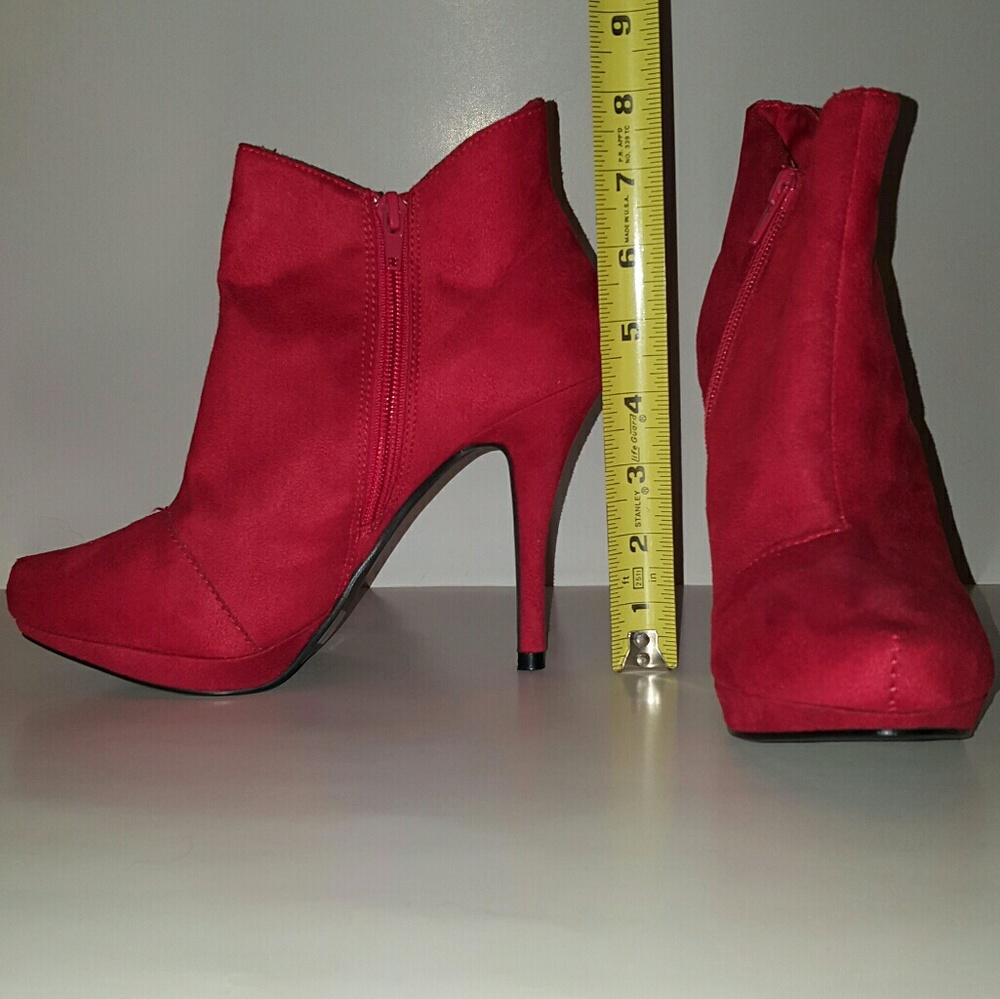 Red heeled booties by Qupid