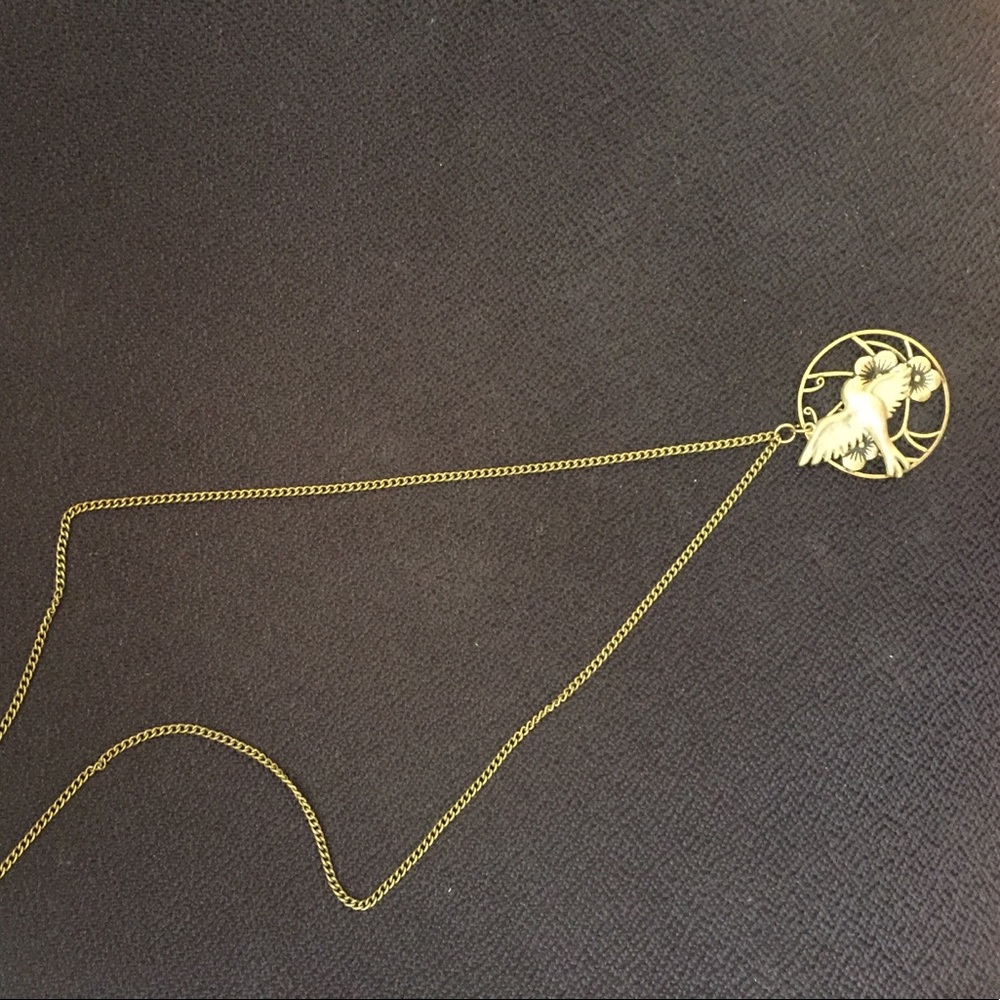 Long Bohemian Mexican style bird necklace .