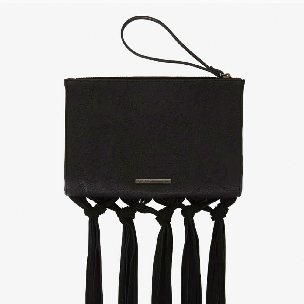 Free with $250 purchade. BCBG wristlet/clutch
