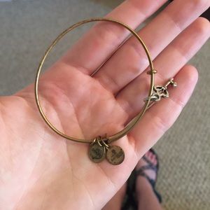 Gold key Alex and Ani bracelet