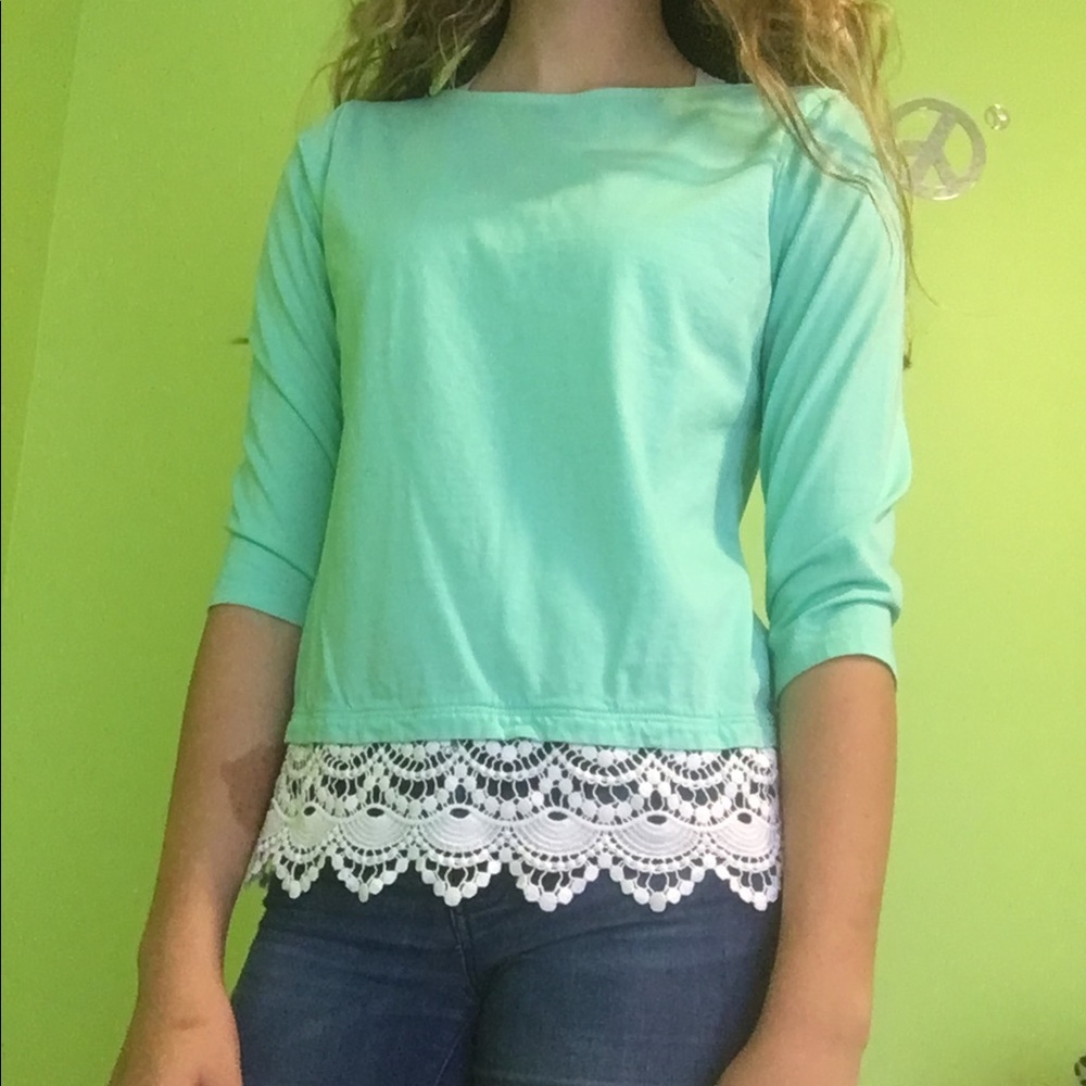 Sea foam green top with lace accent