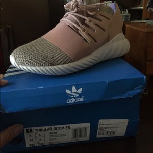 Pink adidas tubular doom shoes