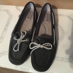 Never worn, black sperrys with silver detail