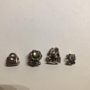 4 pandora charms in fair condition