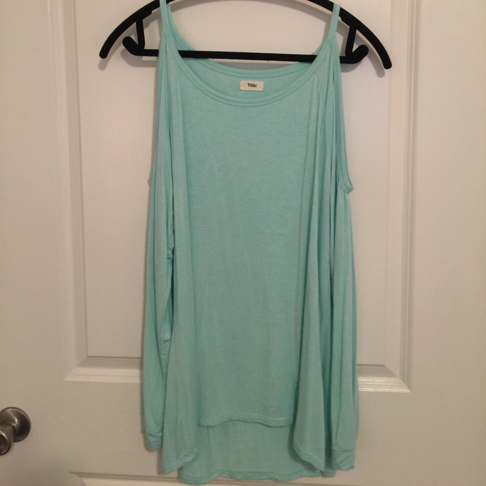 Blue long sleeve shirt with shoulder cut outs