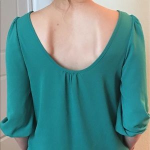 Francesca's green drapy blouse open back