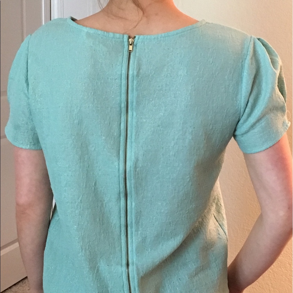 Francesca's teal zipper back shirt